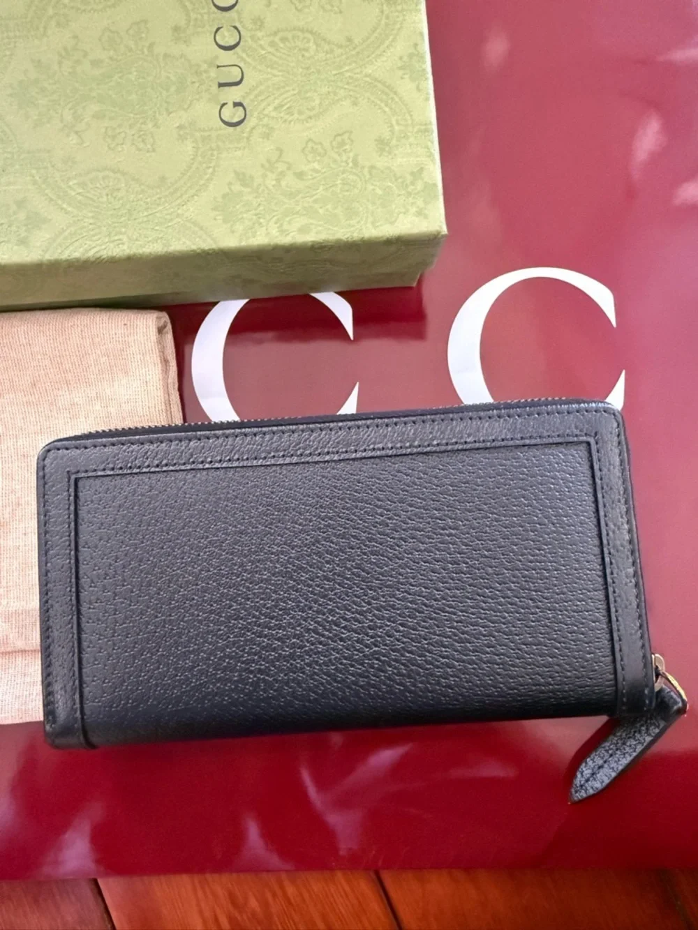 Gucci Black Pebbled Leather Zip Wallet with Gold GG and Bamboo Accent